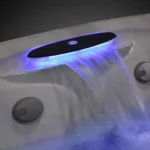 waterfall in hot tub with lights from jacuzzi