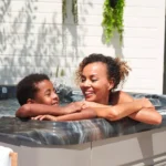 mother and child enjoying family time in a caldera spas hot tub.