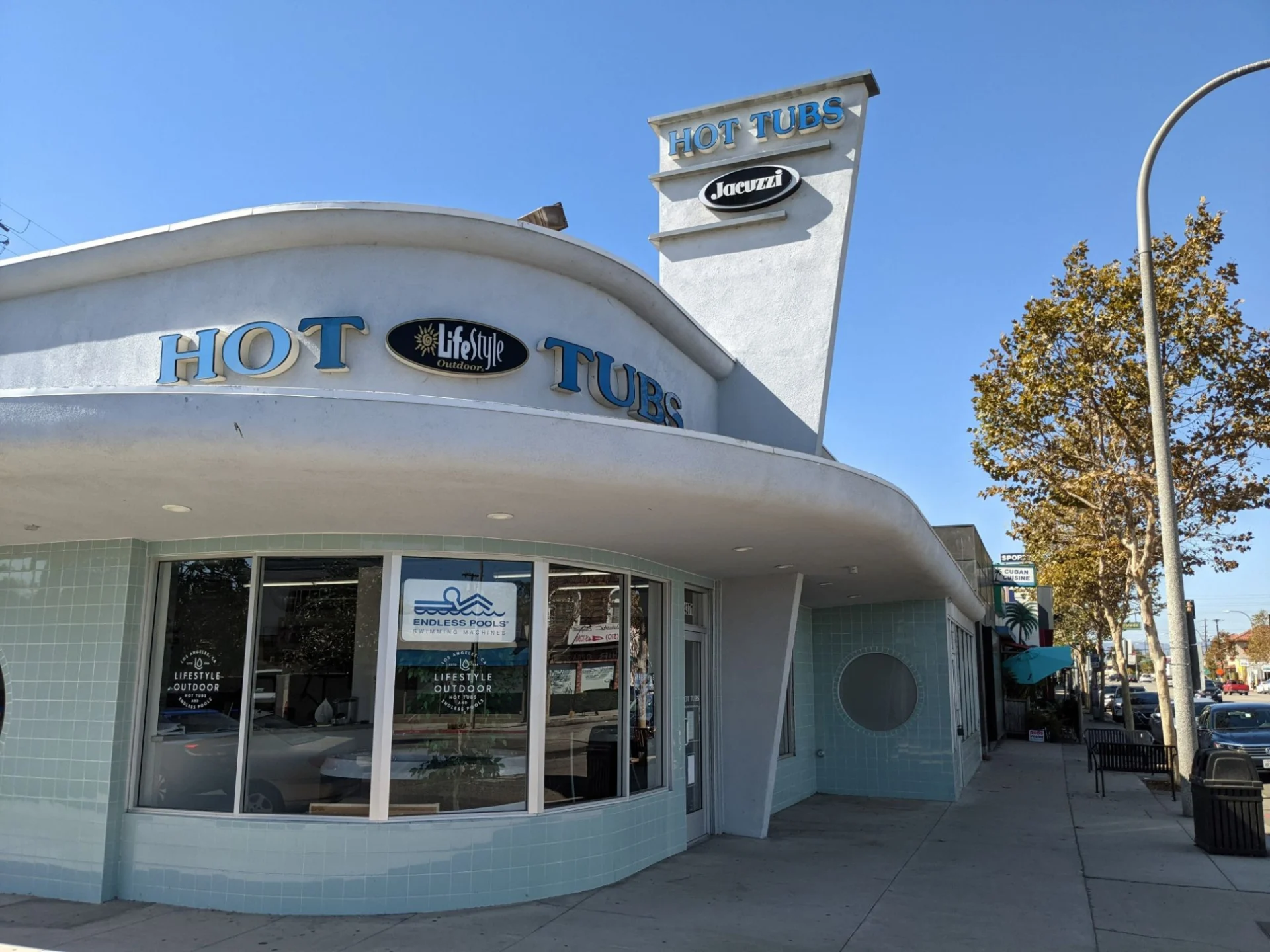 Lifestyle Outdoor hot tub showroom exterior in Culver City with Jacuzzi and Endless Pools signage.