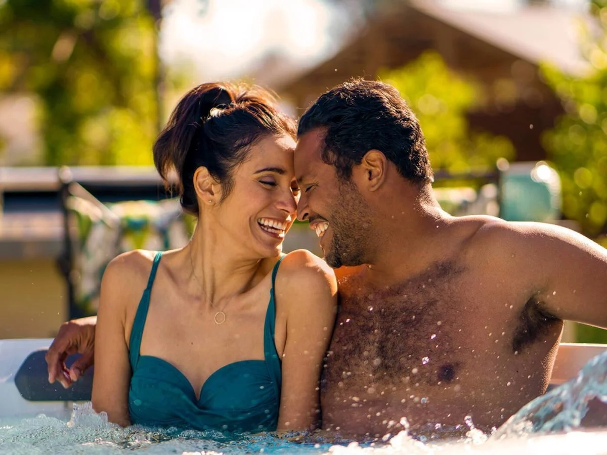 hot spring spas hot spot collection page aspot lifestyle couple in spa 1200x900 1